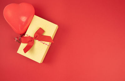 High angle view of box on red wall