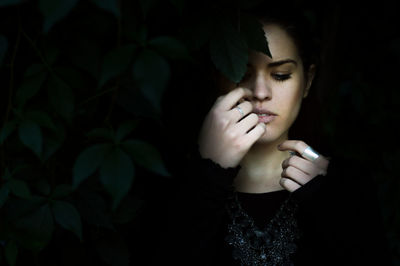Mid section of man against black background