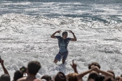 People enjoying at beach