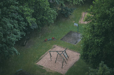 High angle view of trees at park during rainy season