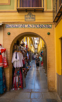 Rear view of woman walking on street