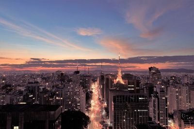 High angle view of city buildings during sunset