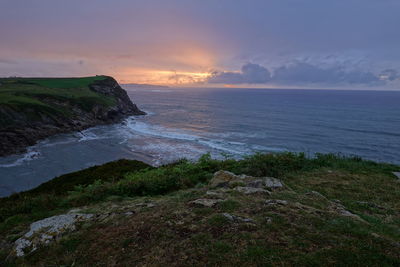 Scenic view of sea against sky during sunset