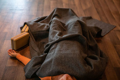 High angle view of hand on table