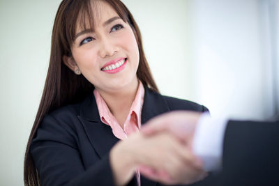 Portrait of a smiling young woman