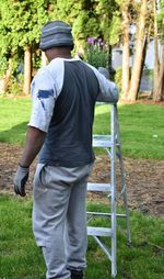 Rear view of man standing on field