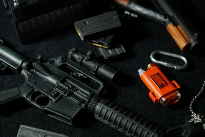 High angle view of ammunitions and hat on table