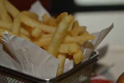 Close-up of french fries in container