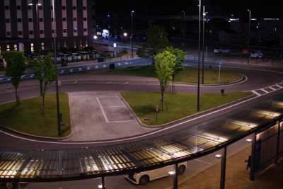 High angle view of illuminated street at night