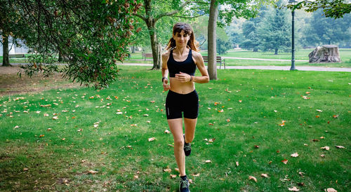 Full length of woman jogging at park