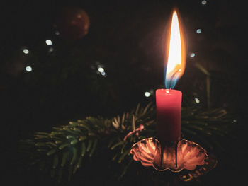 Close-up of burning candle