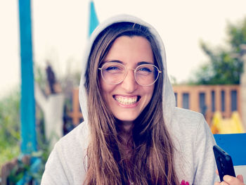 Portrait of smiling young woman