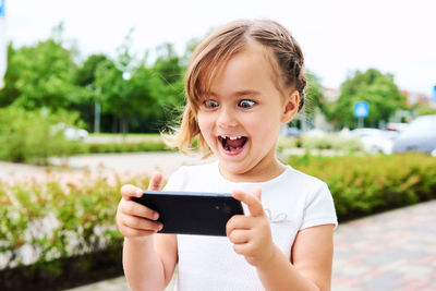 Close-up portrait of smiling girl