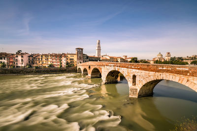 Arch bridge over river