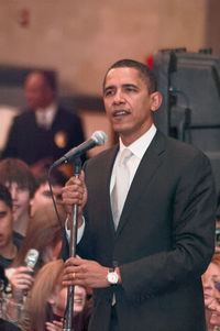 Portrait of man with arms raised at home