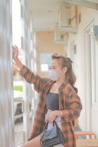 Young woman using mobile phone