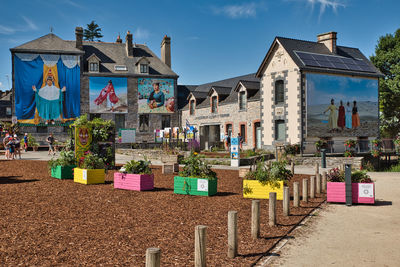 View of cemetery against buildings