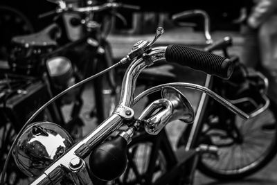 Close-up of bicycle with horn in parking lot