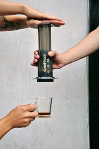 Close-up of woman hand holding drink