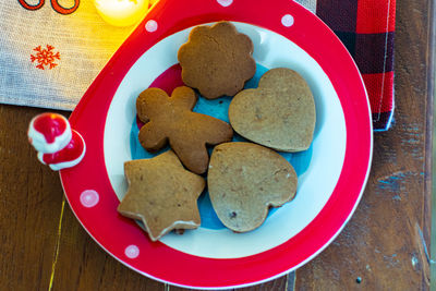 High angle view of cookies in plate on table