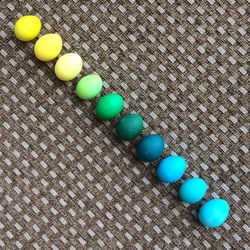 High angle view of multi colored balls on table