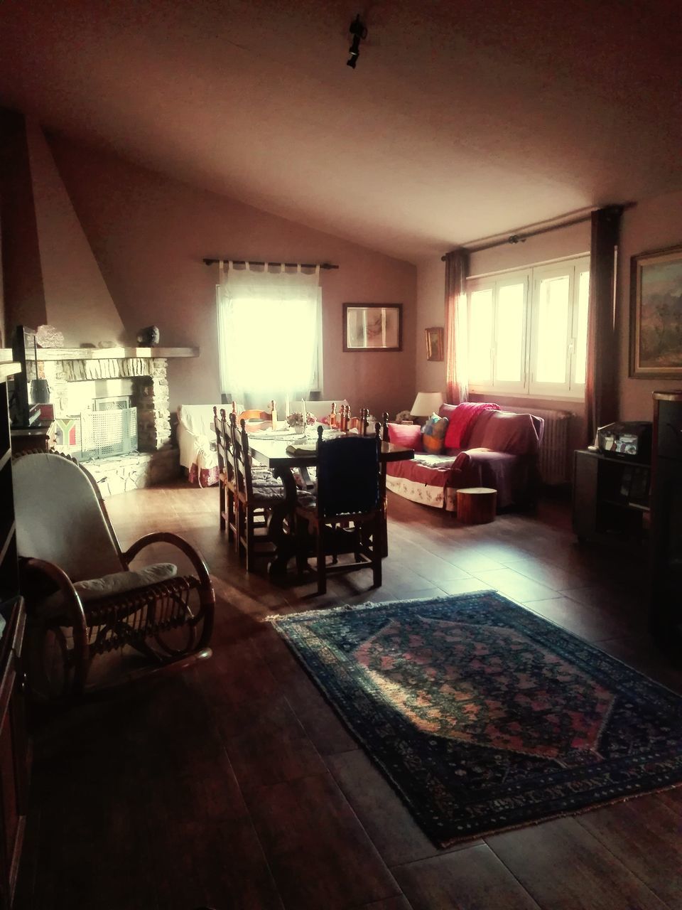 EMPTY CHAIRS AND TABLE IN HOUSE