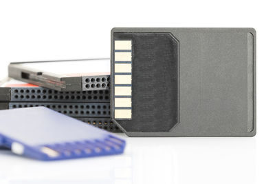 Close-up of computer keyboard on table against white background