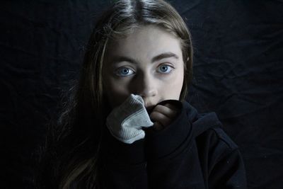 Close-up portrait of young woman