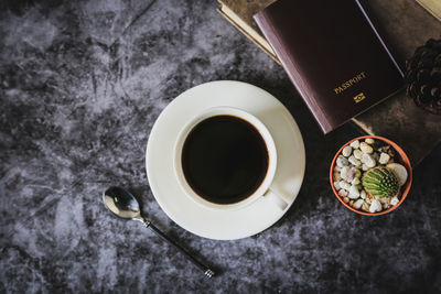 High angle view of black coffee on table