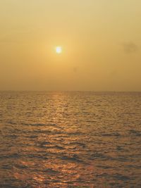 View of calm sea at sunset