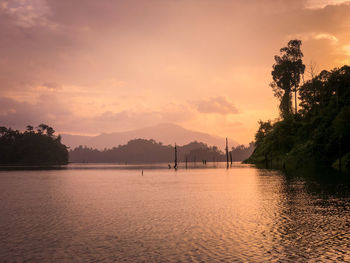 Scenic view of lake against sky during sunset