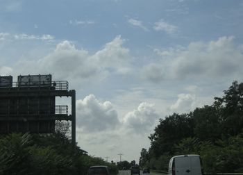 Low angle view of building against cloudy sky