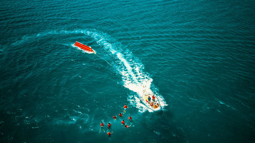 High angle view of people in sea