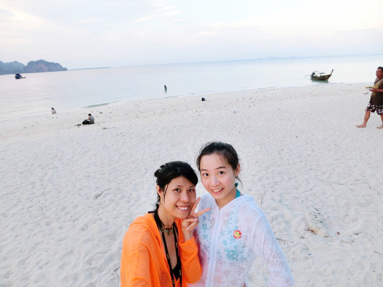 sea, beach, water, leisure activity, lifestyles, shore, vacations, sand, horizon over water, togetherness, person, childhood, boys, sky, elementary age, happiness, enjoyment, nature