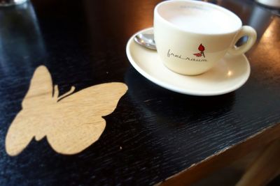 Close-up of coffee cup on table