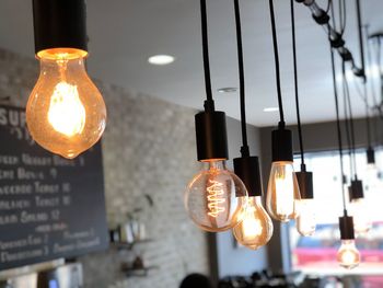 Illuminated light bulbs hanging