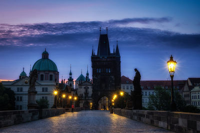 View of illuminated buildings at dusk