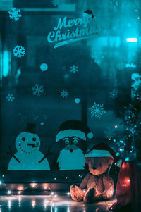 View of illuminated fish tank at aquarium