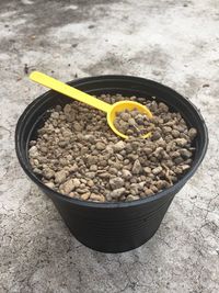 High angle view of black coffee in container