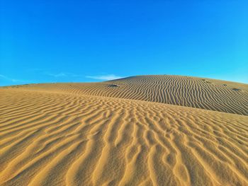 Sand dunes and blue sky