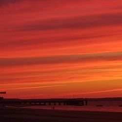 Scenic view of dramatic sky during sunset