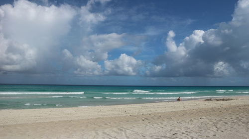 Scenic view of beach against sky