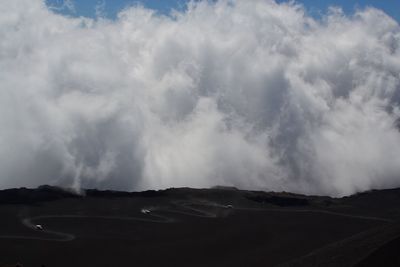 View of landscape against cloudy sky