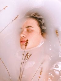 Portrait of young woman in bathroom