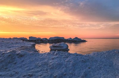 Scenic view of sea against sky during sunset