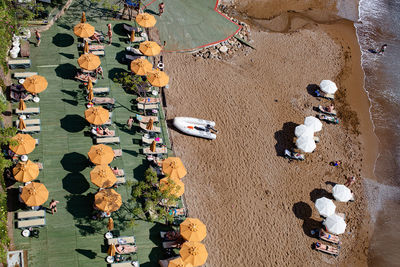 Aerial view of people relaxing on beach
