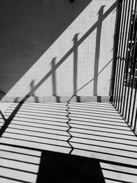 Shadow of railing on staircase