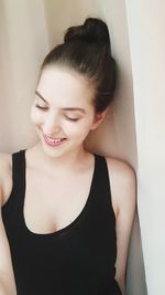 Close-up of smiling young woman