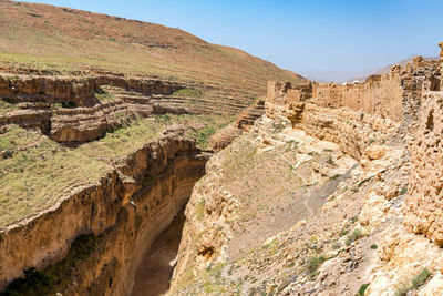 Scenic view of rock formations against sky