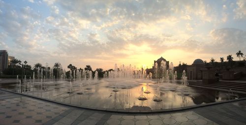 Panoramic view of buildings against sky during sunset